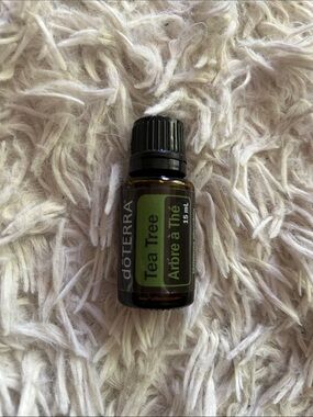 Doterra Tea Tree Essential Oil - green
Label on Amber Bottle 15 ml, unopened